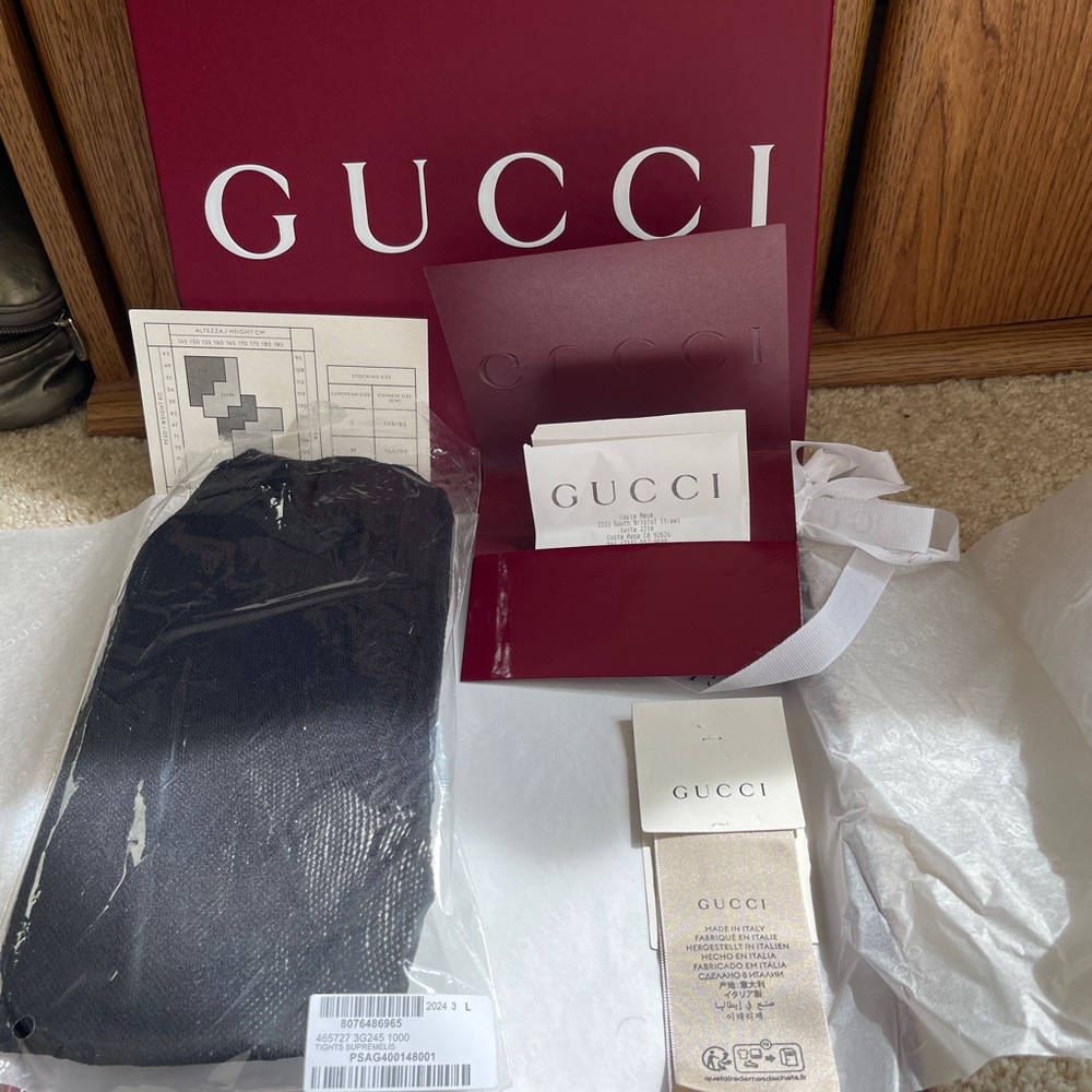 Gucci Black GG LOGO tights. Size Large, never worn with receipt, tags and box!